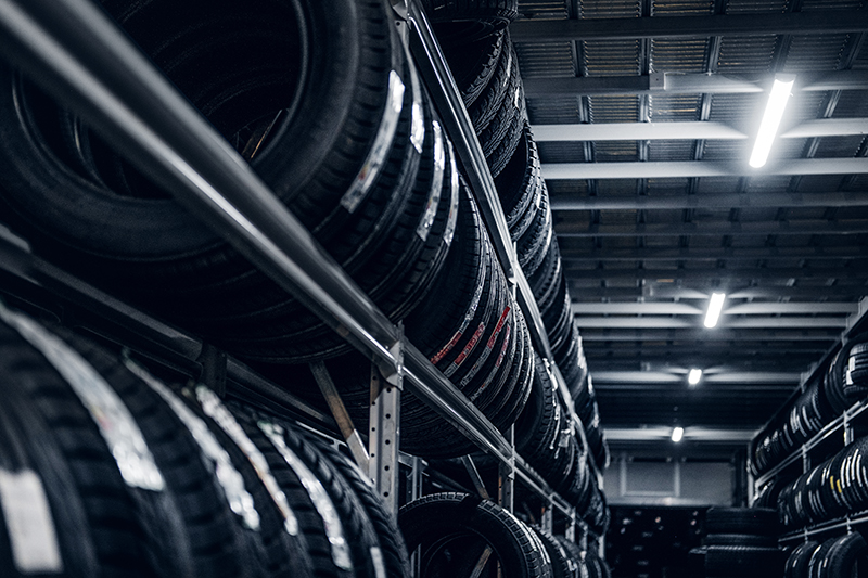 Variety of tyres at busy warehouse